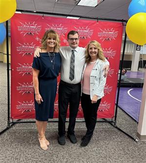 Michella and Tracy posing with a graduate from the Project SEARCH program in 2024.