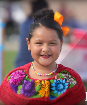  Photo of smiling student at Lincoln's Hispanic Heritage Fiesta