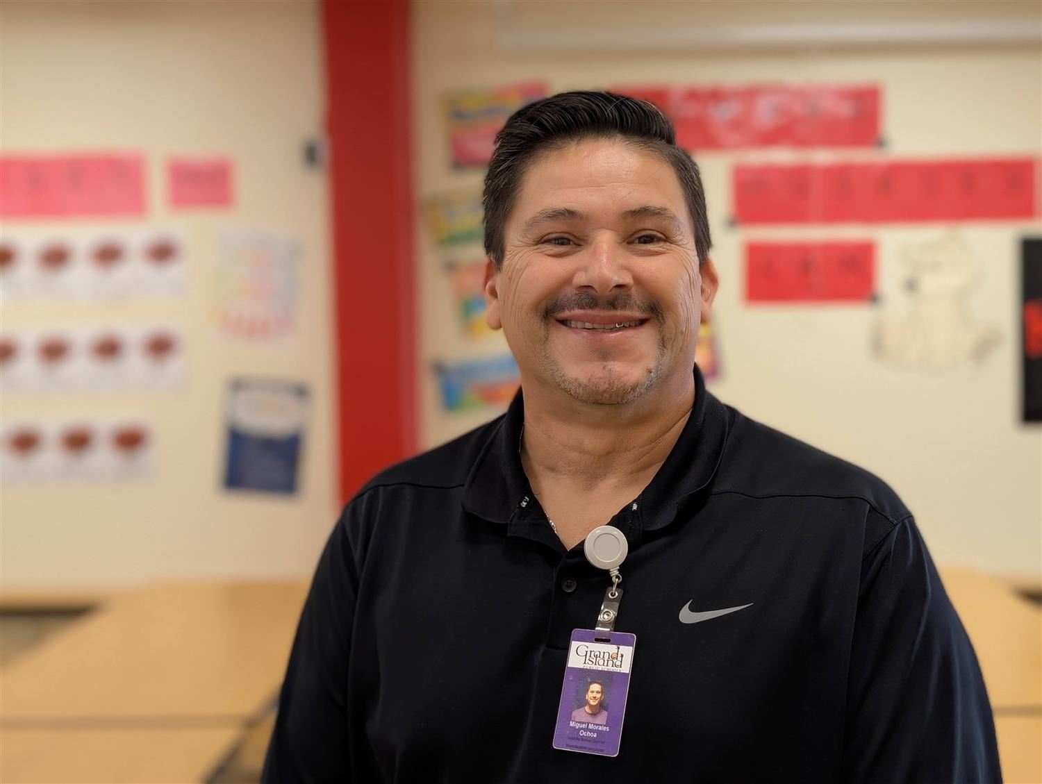 Miguel Morales smiling in the Howard Elementary cafeteria